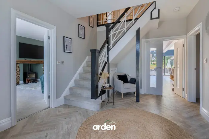 Renovated hallway with the original 1930s staircase